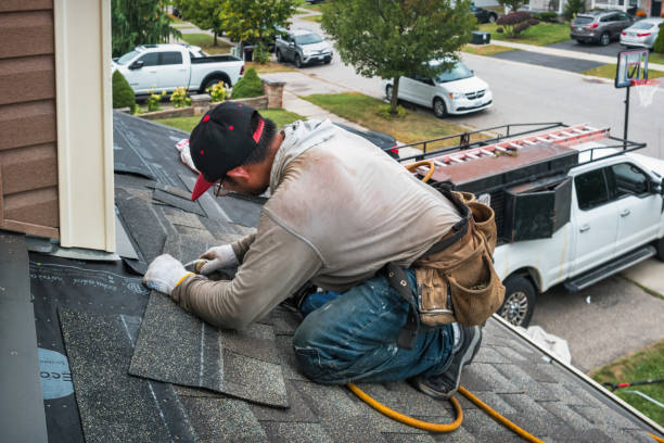 Professional Roofing technician working in Galveston, IN